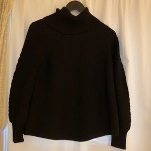 Beautiful ribbed black turtle-neck sweater